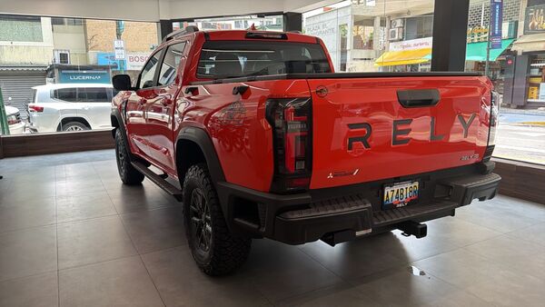 RELY R8 naranja WhatsApp_Image_2026 04 08_at_220754_1 - pickup 4x4 doble cabina en Venezuela
